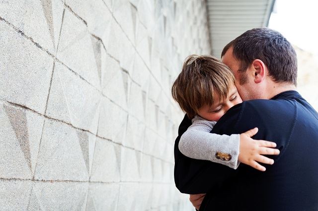 guardian carrying child